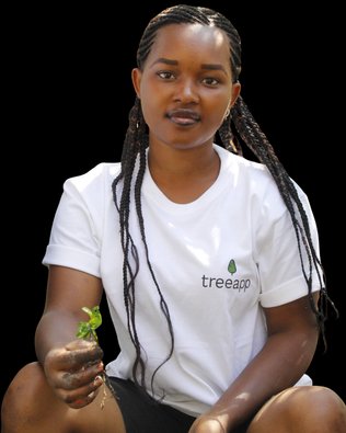 Treeapp team member planting a young tree sapling at a forest restoration site in Burundi